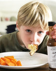 Child eating umami everyday sauce mild