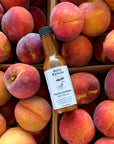 Peach Cayenne Hot Sauce on peaches