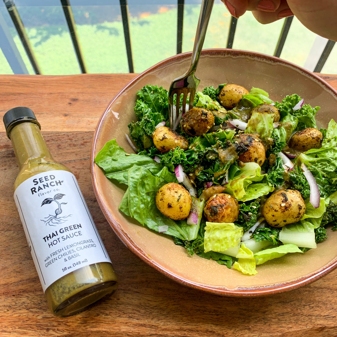 Thai Green Hot Sauce on a salad